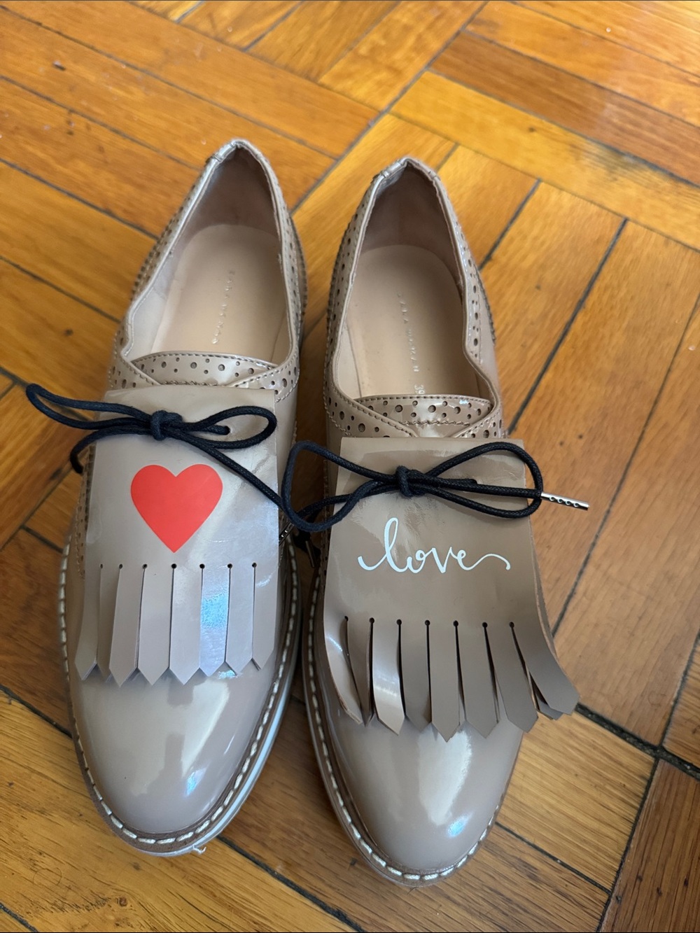 Zara Taupe Fringe Lace-Up Loafers with Red Heart Accent